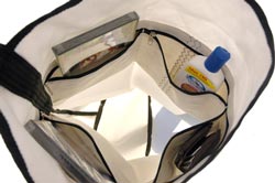 Recycled sails are used for the four inner pouches of the sailcloth Tender Bag.