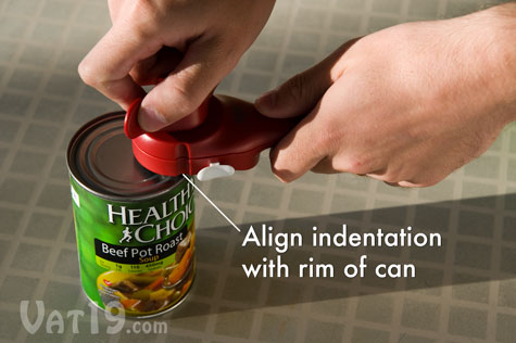 To begin opening a can with the Auto Safety Master Opener, simply align the identations with the rim of the can.
