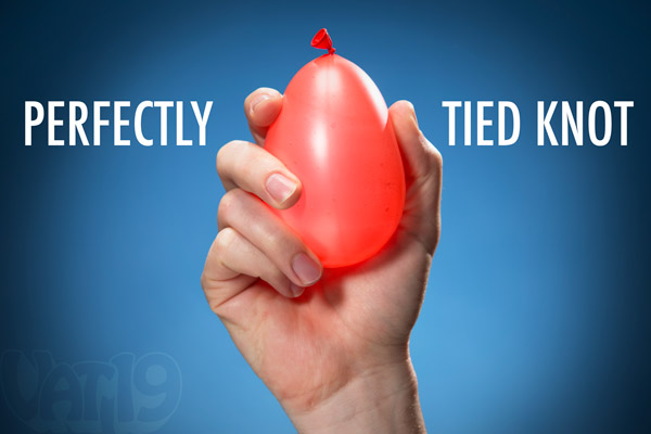 The Tie-Not Battle Pump produces a perfectly tied water balloon in seconds.