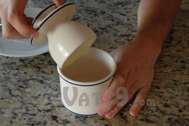 Place the lid of the Butter Crock into the base.