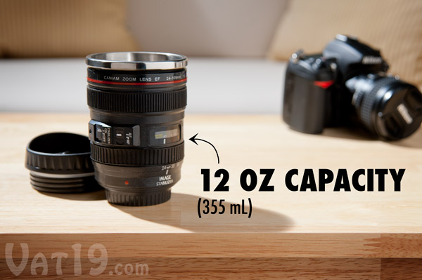 Camera Lens Mug sitting on a coffee table.