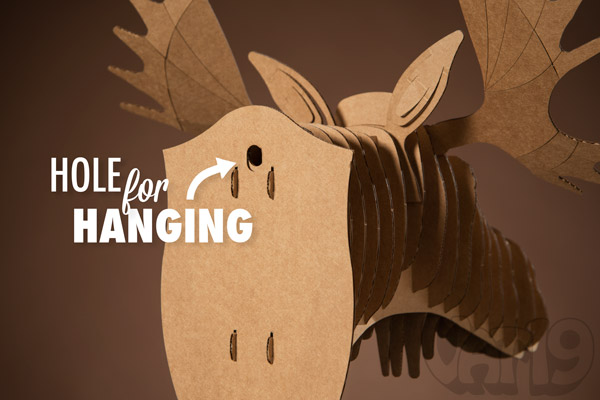 A small hole on the back of each Cardboard Safari Animal makes mounting a snap.