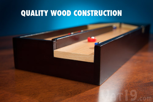 The Executive Desktop Shuffleboard Game features quality wood construction.