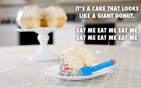 Giant Donut Cake on a table.