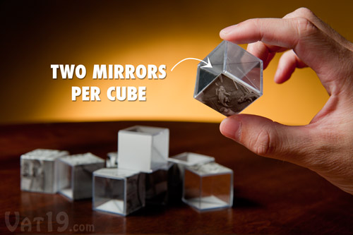 Each cube features two mirrored sides as well as sections from the five M.C. Escher images.