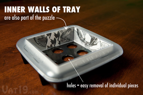 Use the inner walls of the tray to reflect parts of each M.C. Escher puzzle into the final image..