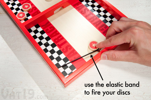 Use the elastic cord to send your wooden discs zooming to the other side.
