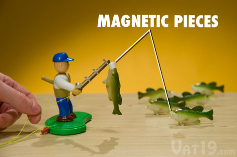 Drop the magnetic lure into the mouths of the six bass and then reel 'em in!