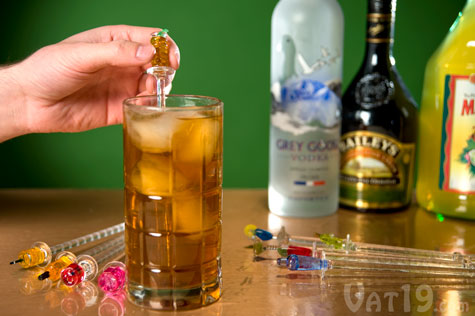 Acrylic Swizzle Sticks with miniature cocktails on top.