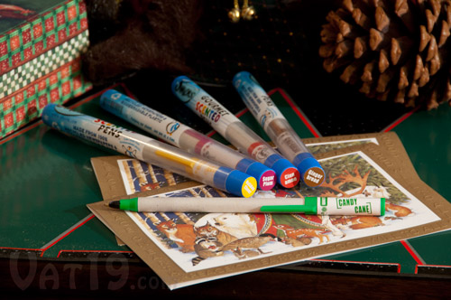 Holiday Smens Scented Pens on a table.