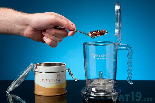 Begin by placing a spoonful of your favorite loose leaf tea into the pot.