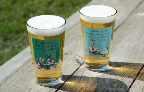 Hilarious sayings on beer pints and koozies.