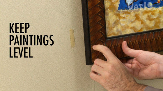 Use Joe's Sticky Stuff to keep pictures and paintings level.