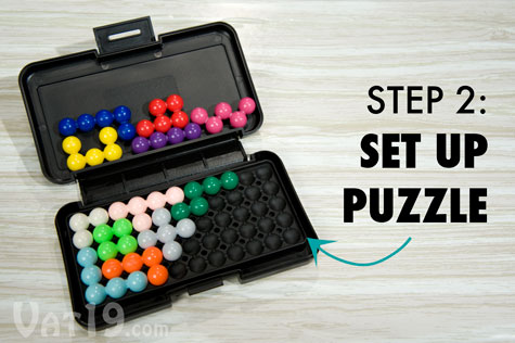 Once your puzzle has been chosen, set up the board according to the puzzle booklet.