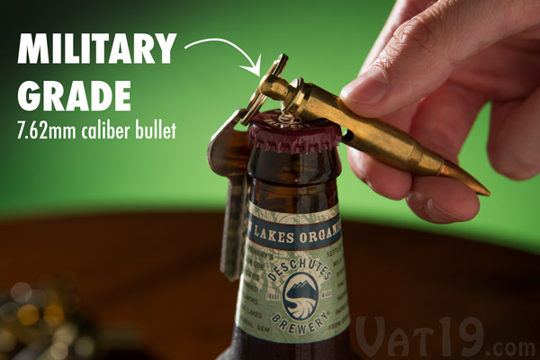 Keychain Bullet Bottle Opener opening a beer.