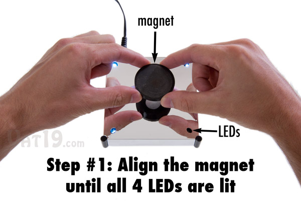 To use the Levitron Revolution, start by aligning the magnet in the center of the base.