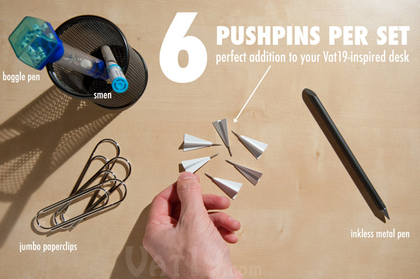 Paper Airplane Pushpins are sold in a set of six pushpins.