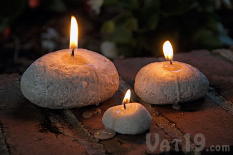 Decorate an outdoor party with our realistic Pebble Candles