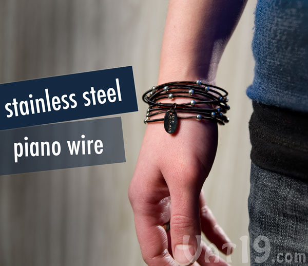 Set of 12 black and silver bracelets made from 18 gauge stainless steel piano wire.