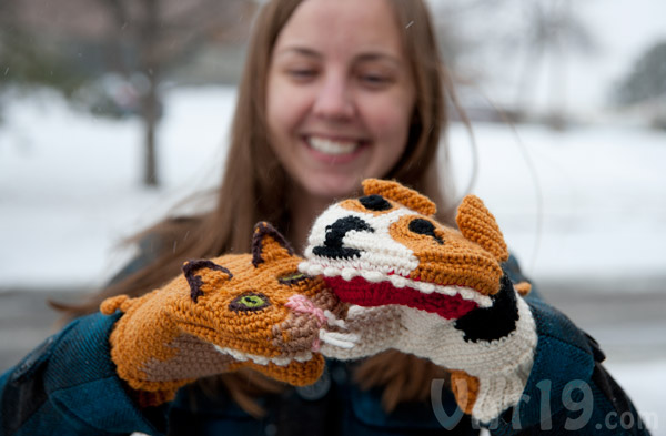Adults will love these spirited versus mittens.