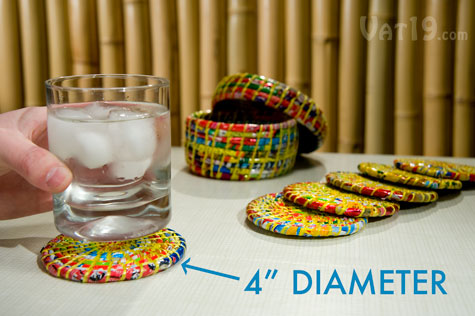 Set of six recycled plastic coasters with storage box.