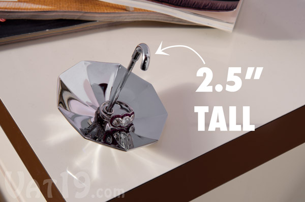 Our chrome-plated Umbra Ring Holders are approximately 2.5 to 3 inches tall.