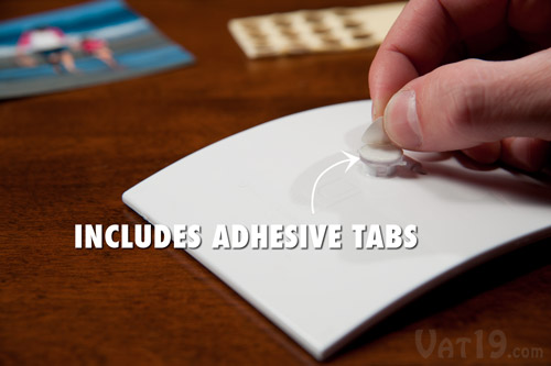 Snap Frames come with double-sided adhesive tabs for mounting.