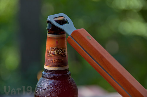 The Sportula features a bottle opener at the end of the handle.