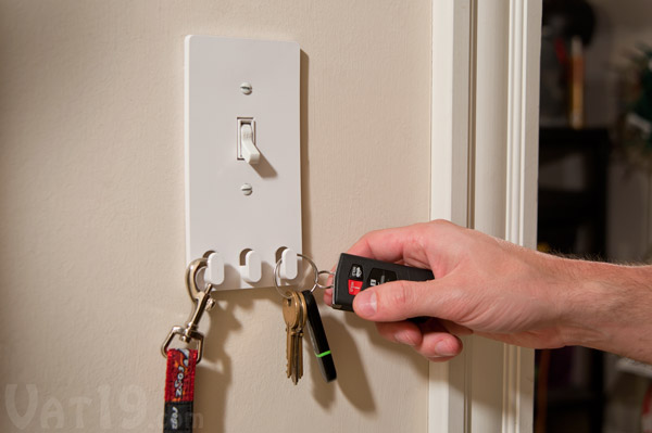 Switch Hooks turns your light switch into a storage area for your keys.