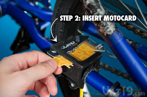 Next, insert one of the three Motocards.