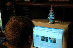 USB Christmas Tree on top of computer.