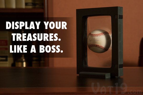 Z-Access Display Frame holding a baseball on a table.